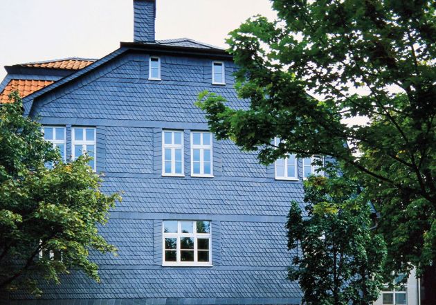 Altmodisches Haus - Dekorativ Deckung Fassade